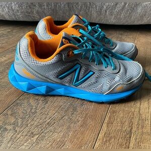 New Balance Gray and Teal Sneakers with Orange Accents